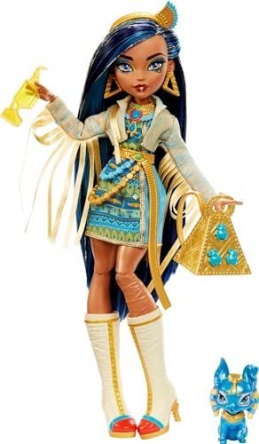 Cleo De Nile doll with blue-streaked hair and fringe jacket